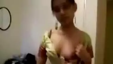 Cute girl stripping off her sari and showing off