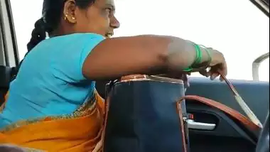 Man shows his dick to a milf in a moving van in Tamil porn