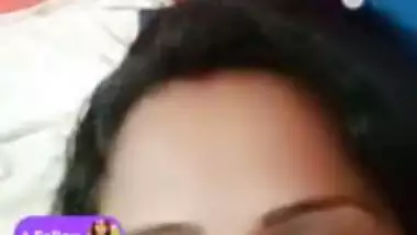 Stripchat girl Trisha playing with naked boobs