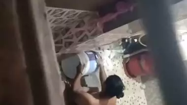 Neighbor aunty taking bath caught by voyeur