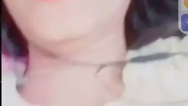 Smiling girlfriend video call to boyfriend shows boobs