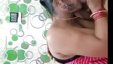 Cute wife tempting husband to suck her huge boobs