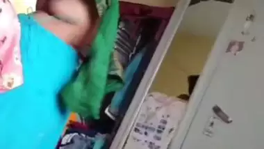 Grandmother wearing blouse and showing naked boobs