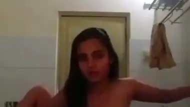 Indian nude MMS of an 18-year-old girl fingering in a bathroom