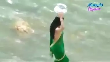 Desi girl in transparent wet saree showing boobs..hot show